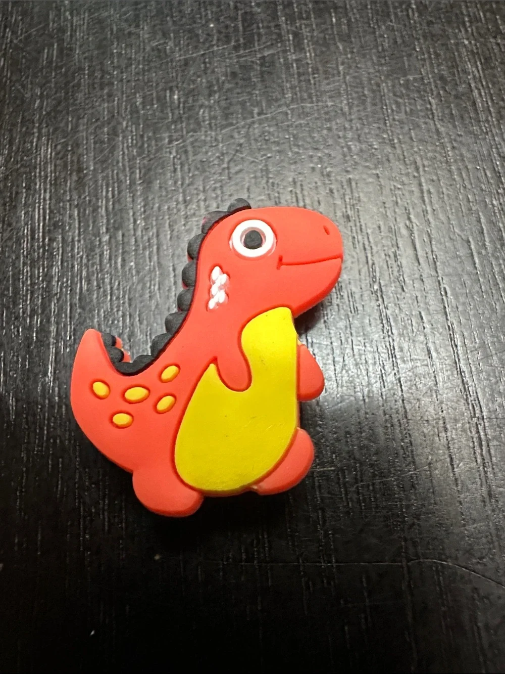 Jibbitz Orange & Yellow Dinosaur Shoe Charm